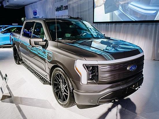 The Ford F-150 Lightning is a fully-electric full-size light duty truck that was unveiled by Ford in May 2021. It has four models, and all are dual-motor, four-wheel-drive, with EPA range estimates of 230–300 mi (370–480 km). The truck is expected to help Ford sell two million EVs a year by 2026. The vehicle is available in the US with prices ranging from $39,974 for the commercial-grade version all-wheel drive (AWD) truck to $90,000 for higher-power/trim/range models. The base version of the truck has 452 hp (337 kW), 230 mi (370 km) range, and a smaller battery that supports a 2,000 lb (910 kg) payload.