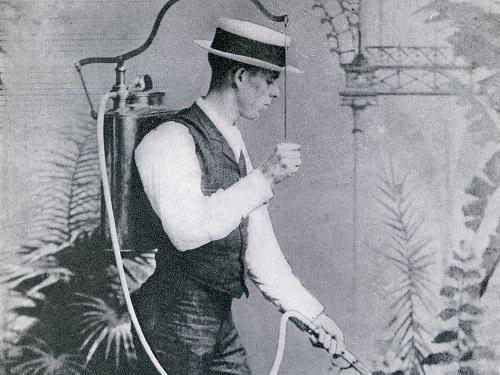 David Fairchild showing off a new crop spraying technique in 1889