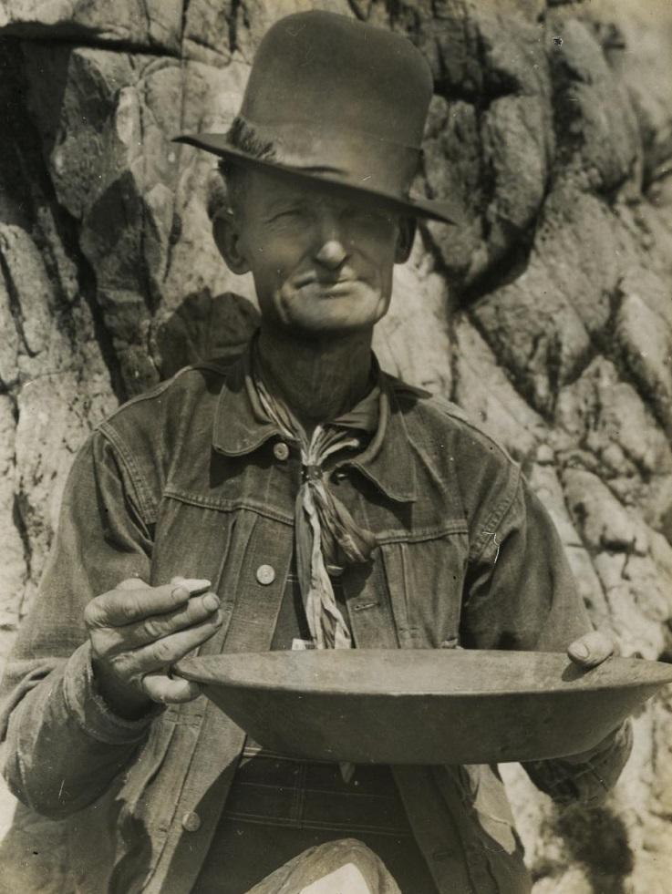 John Stone With Gold Mining Pan. Wearing Jean jacket and pants. August, 1939. California Gold: Northern California Folk Music from the Thirties Collected by Sidney Robertson Cowell. American Folklife Center