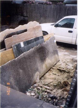 Debris preventing the complete insertion of the poles into a slab rack