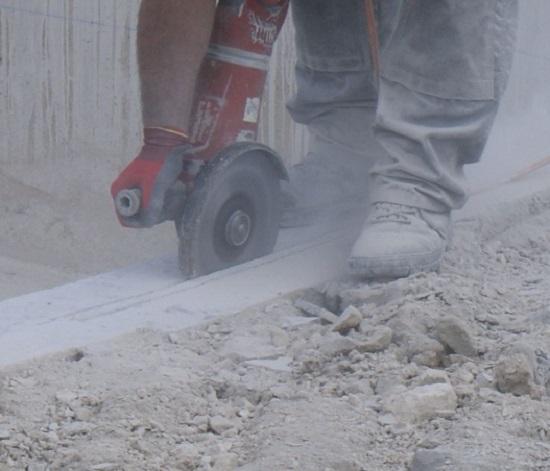 Controlling Silica Dust Exposure from Handheld Grinders